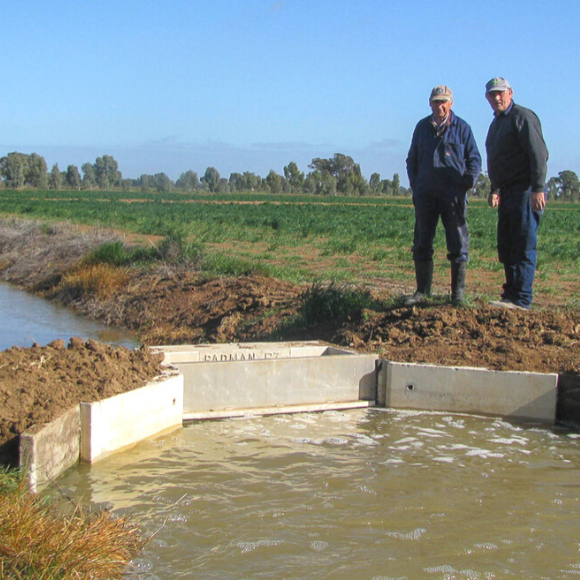 John with a customer on-farm