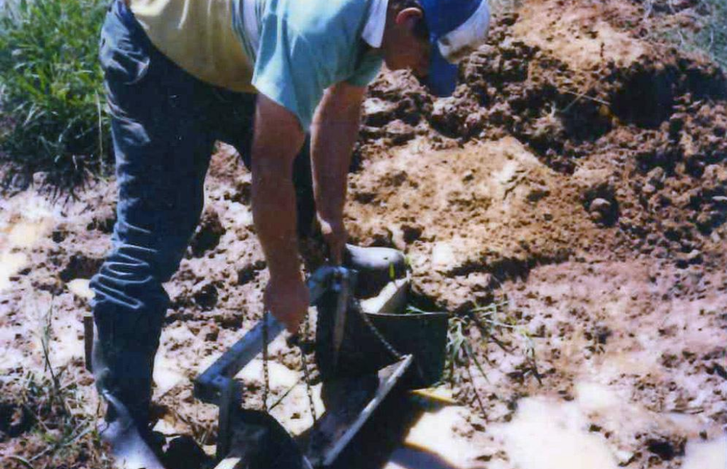 John installing irrigation outlet